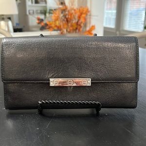 Cartier long black wallet.. very good pre-loved condition..Authentic
